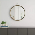 Miroir d'appoint rond avec cadre en fer doré